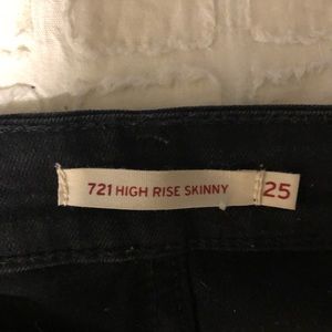 Black Levi’s 721 high rise jeans
